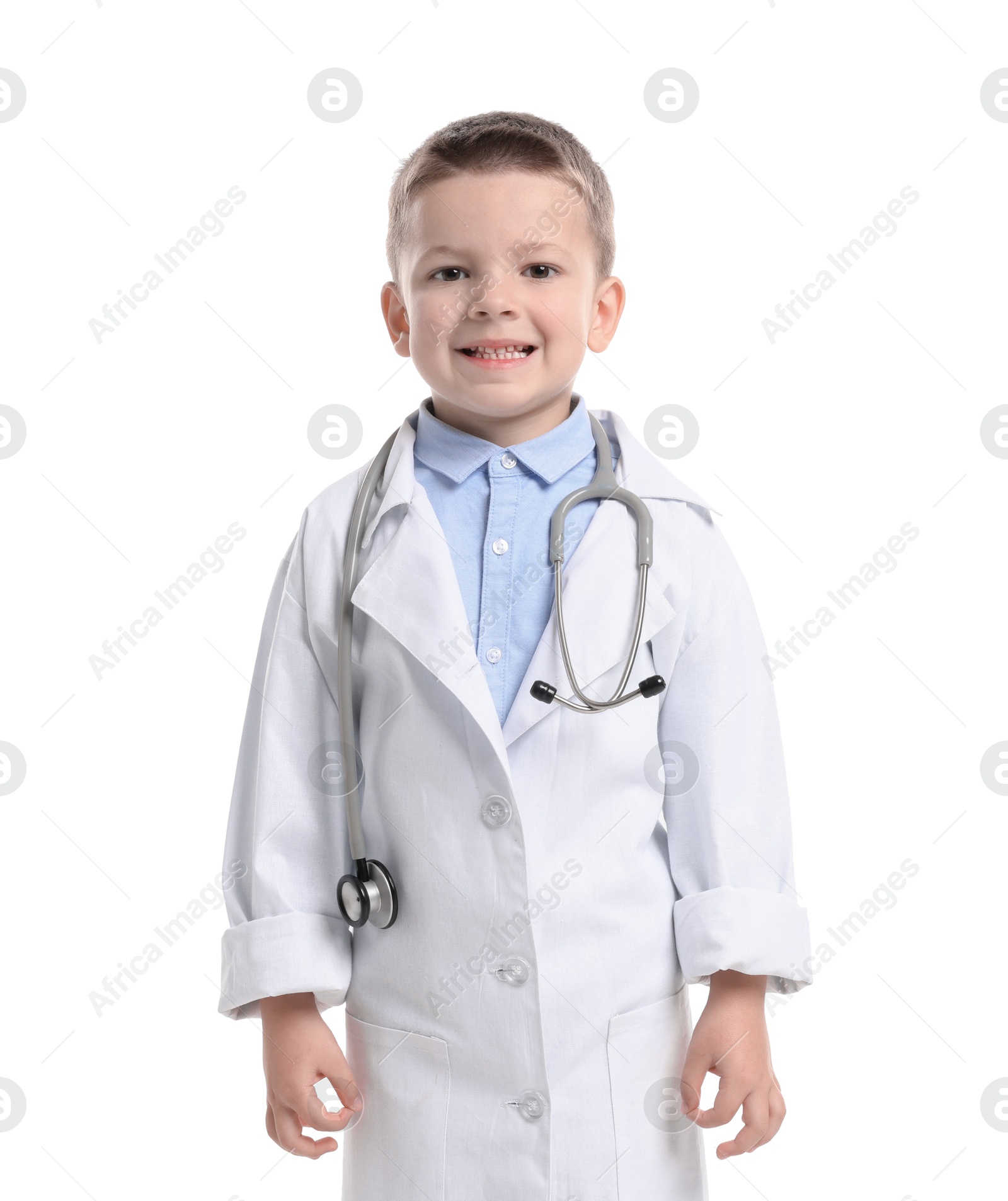 Photo of Little boy with stethoscope pretending to be doctor on white background. Dreaming of future profession