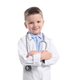 Photo of Little boy with stethoscope pretending to be doctor on white background. Dreaming of future profession