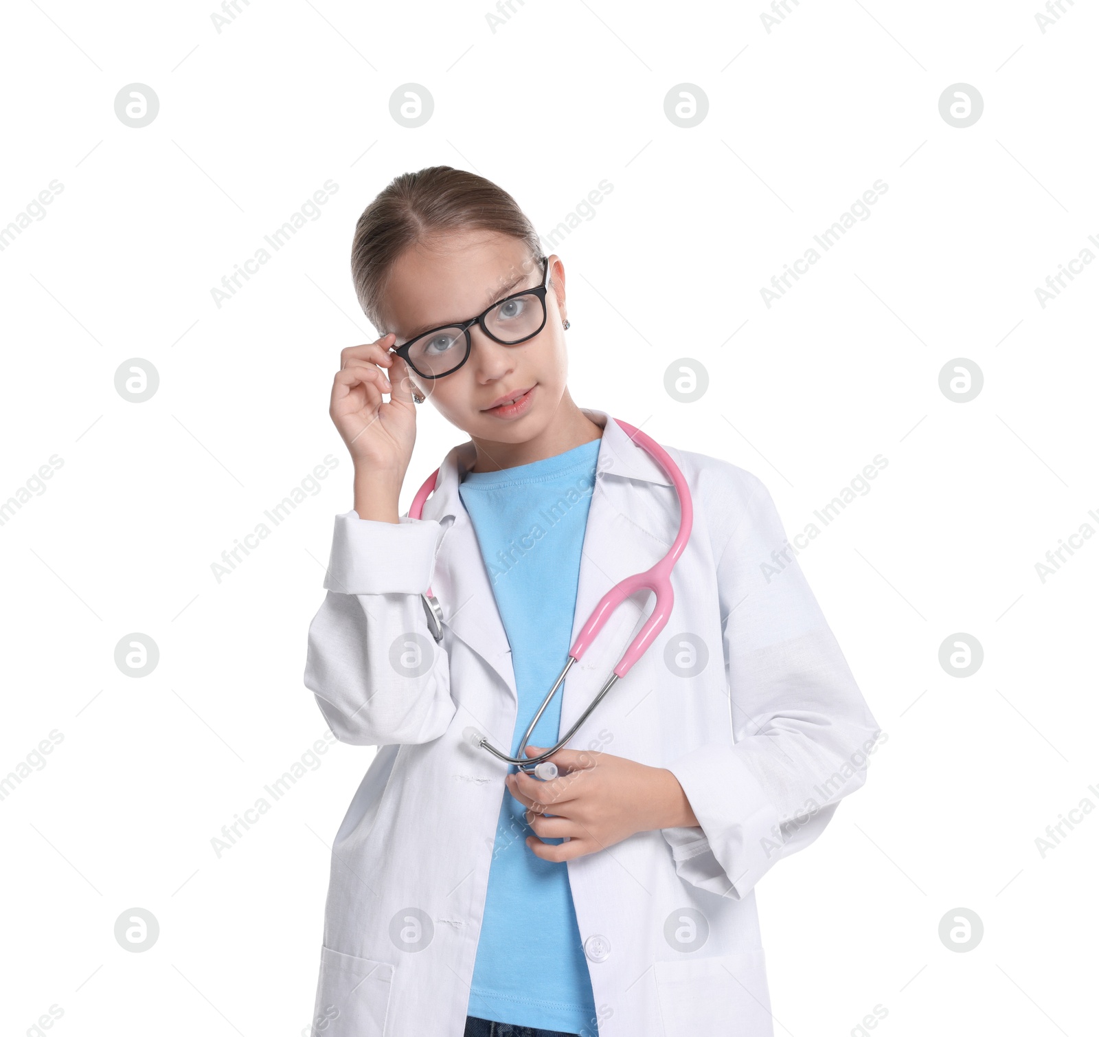 Photo of Girl with stethoscope pretending to be doctor on white background. Dreaming of future profession