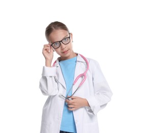 Photo of Girl with stethoscope pretending to be doctor on white background. Dreaming of future profession