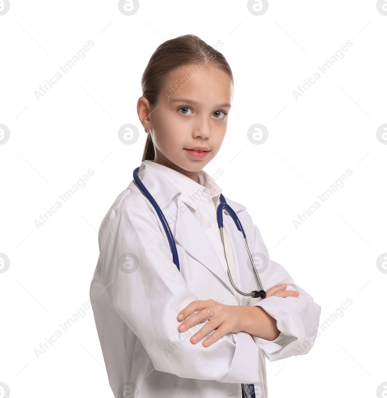 Photo of Girl with stethoscope pretending to be doctor on white background. Dreaming of future profession