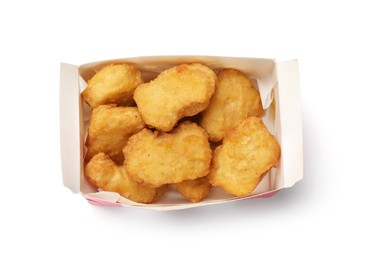 Photo of Delicious chicken nuggets in carton box isolated on white, top view