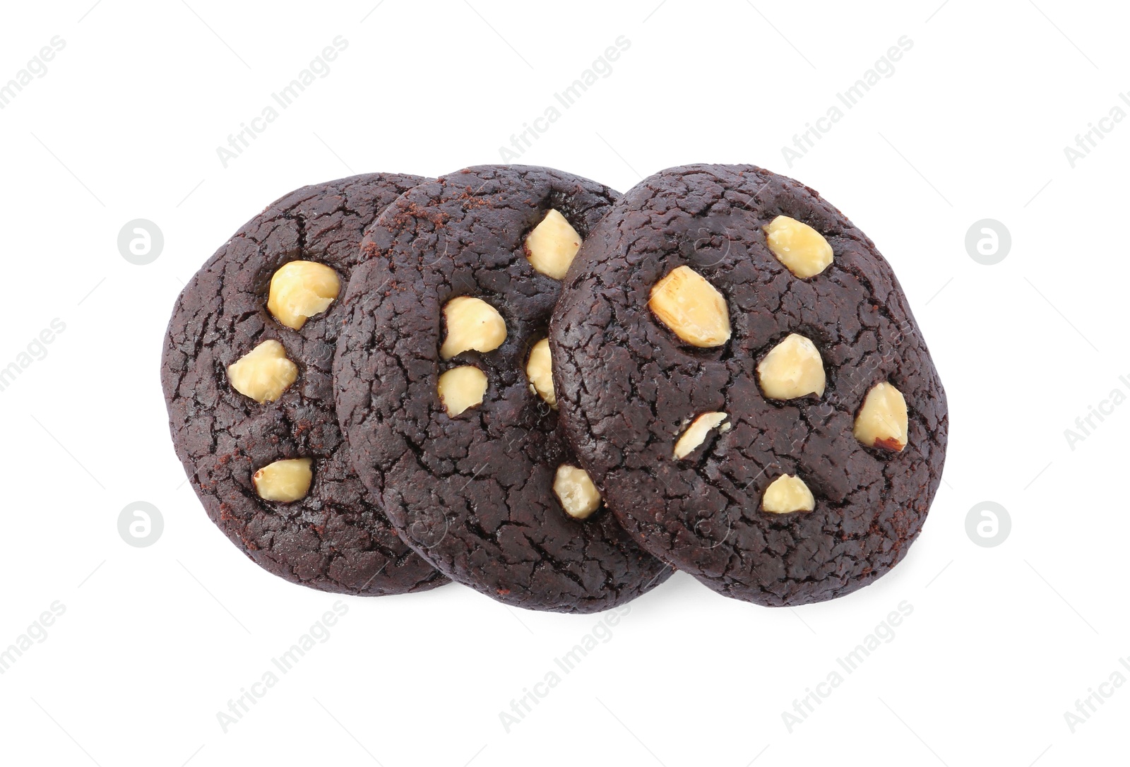 Photo of Tasty chocolate cookies with hazelnuts isolated on white, top view