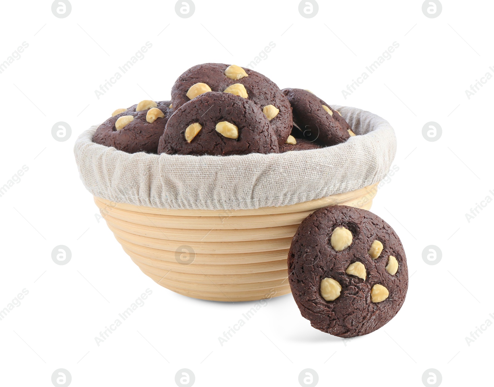 Photo of Tasty chocolate cookies with hazelnuts in basket isolated on white