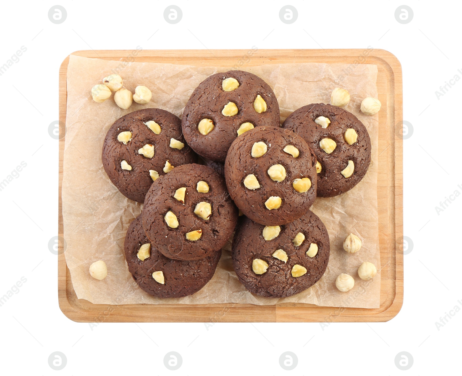 Photo of Tasty chocolate cookies with hazelnuts isolated on white, top view