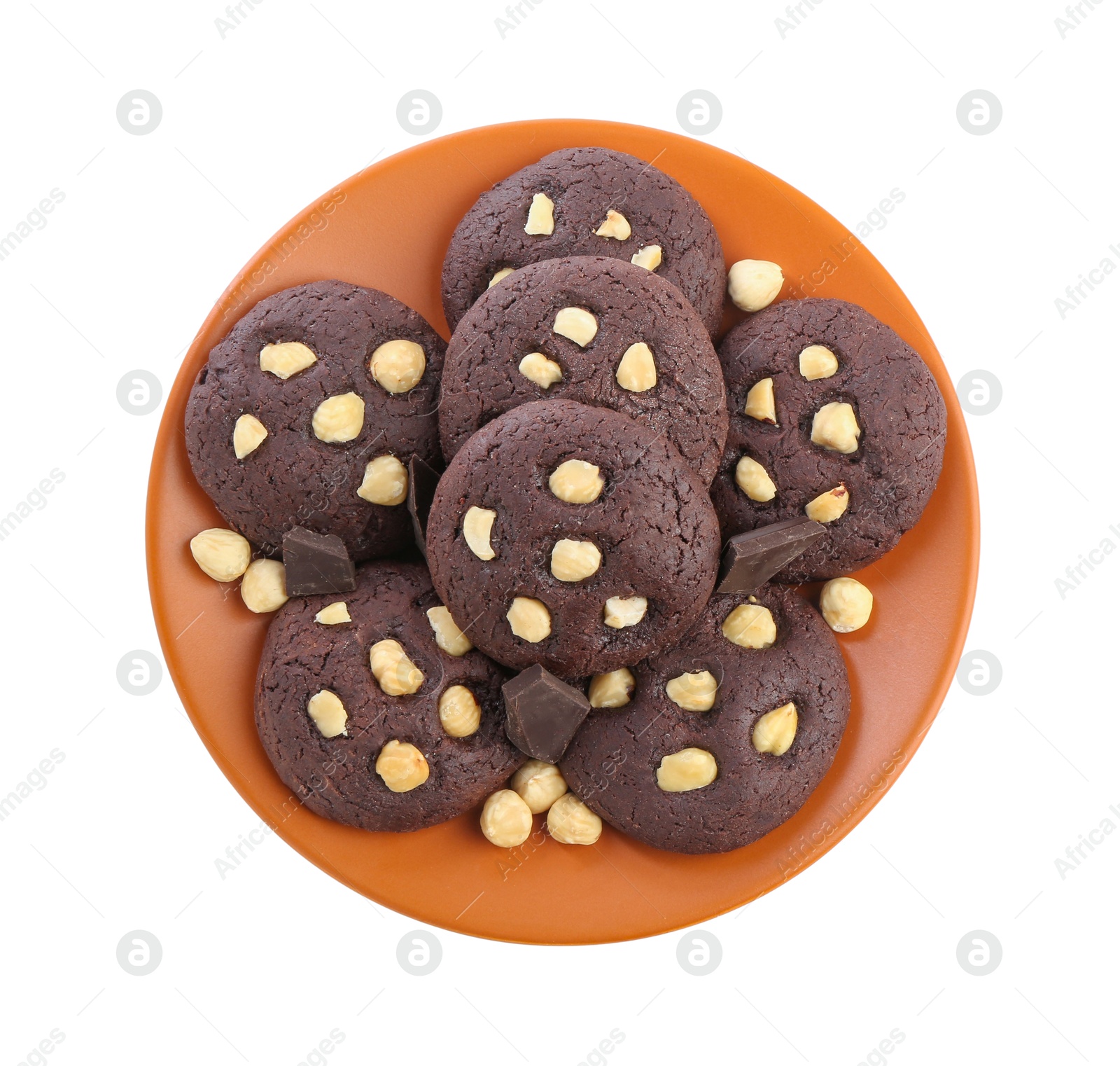 Photo of Tasty chocolate cookies with hazelnuts isolated on white, top view