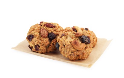 Photo of Delicious oatmeal cookies with dried cranberries and nuts isolated on white