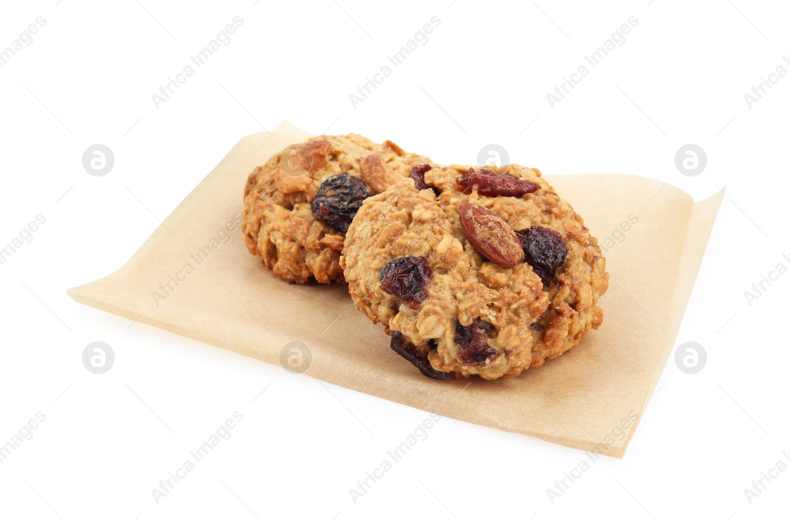 Photo of Delicious oatmeal cookies with dried cranberries and nuts isolated on white