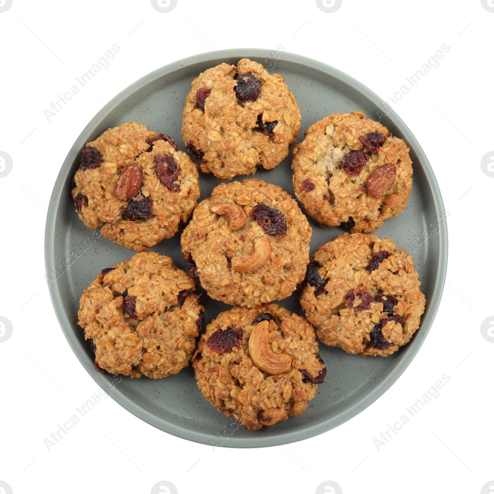 Photo of Delicious oatmeal cookies with dried cranberries and nuts isolated on white, top view