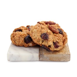 Photo of Delicious oatmeal cookies with dried cranberries and nuts isolated on white