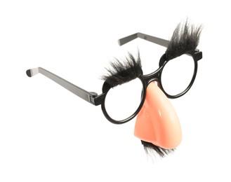 Photo of Funny eyeglasses with fake nose, mustache and eyebrows on white background