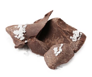 Photo of Pieces of chocolate with salt isolated on white