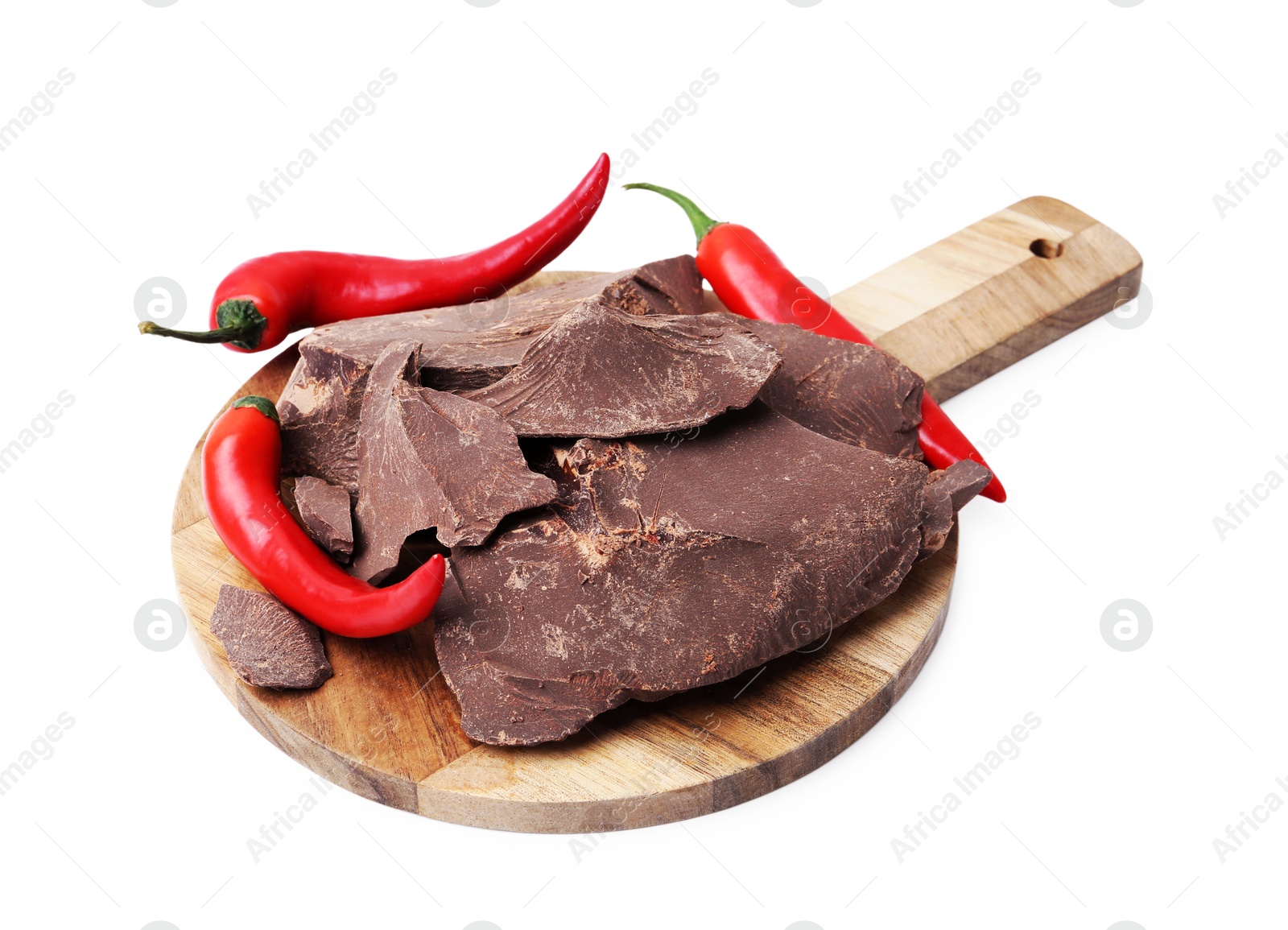 Photo of Pieces of tasty chocolate with chili peppers isolated on white