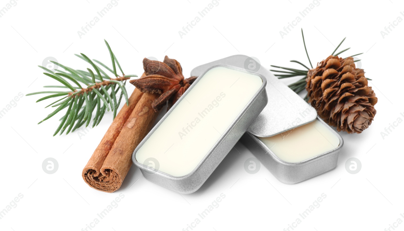 Photo of Natural solid perfume, fir twig and condiments isolated on white