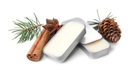 Photo of Natural solid perfume, fir twig and condiments isolated on white