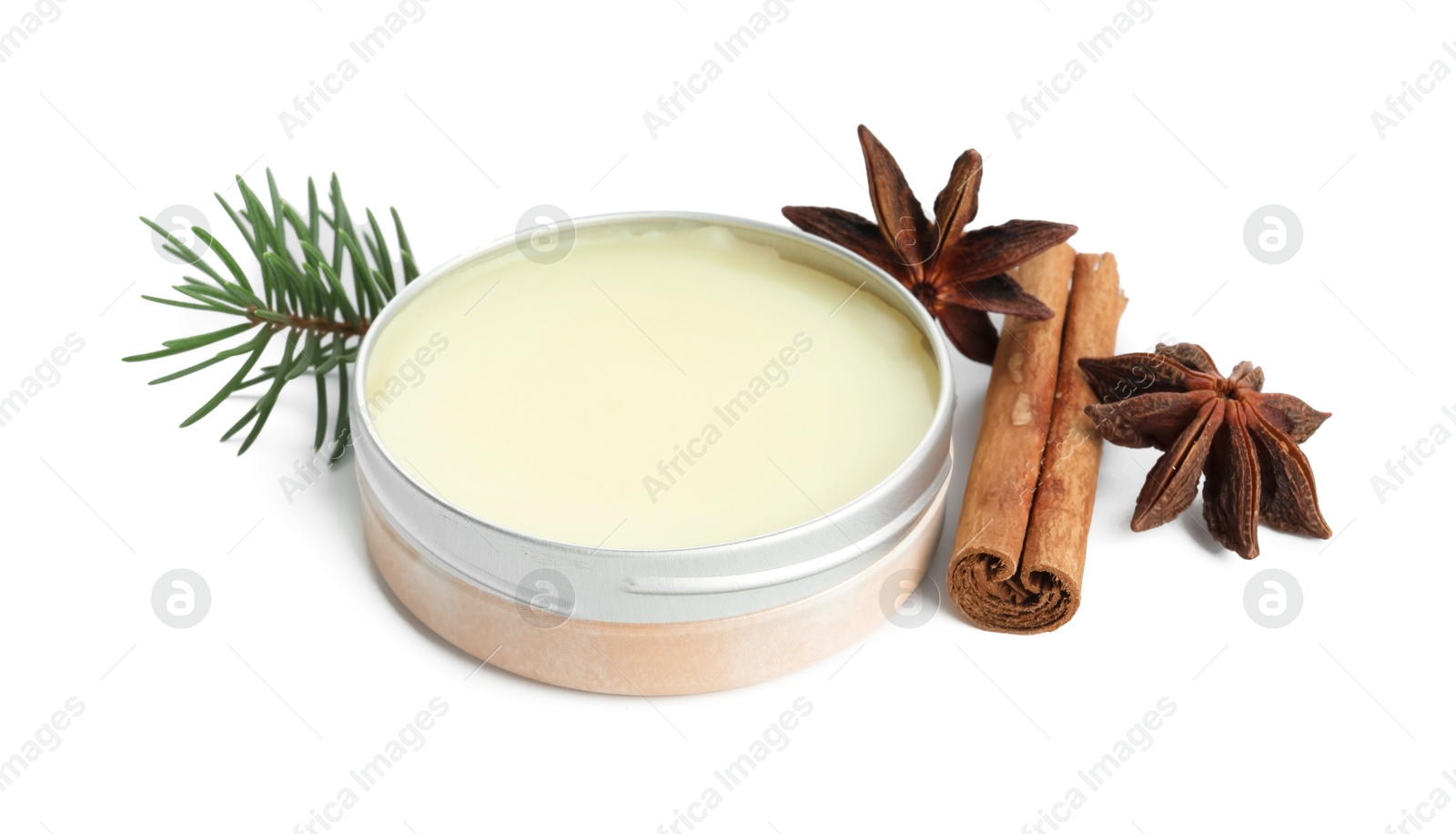 Photo of Natural solid perfume, fir twig and condiments isolated on white