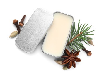 Photo of Natural solid perfume, fir twig and condiments isolated on white, top view