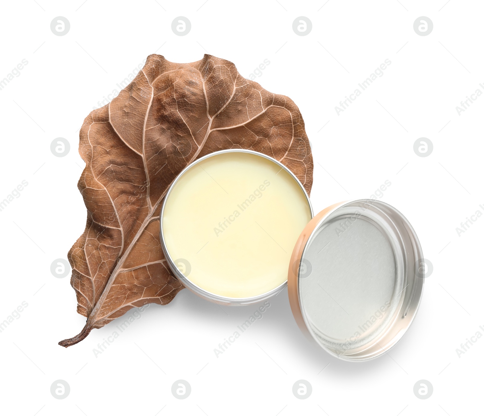 Photo of Natural solid perfume and dry leaf isolated on white, top view