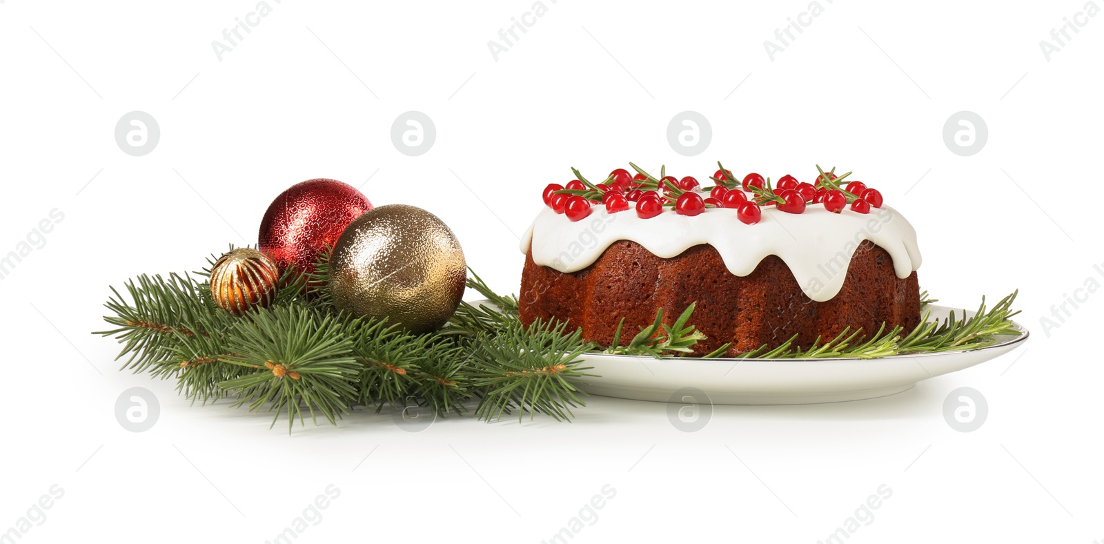 Photo of Beautifully decorated Christmas cake, fir branches and baubles on white background