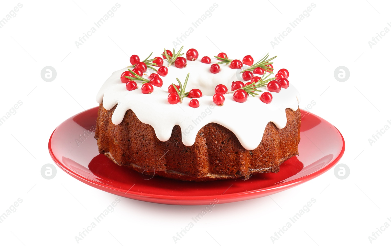 Photo of Traditional Christmas cake decorated with currants and rosemary isolated on white