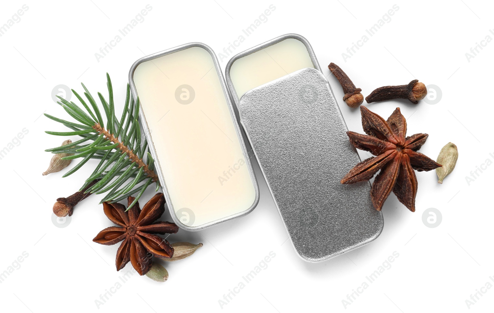 Photo of Natural solid perfume, fir twig and condiments isolated on white, top view