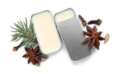 Photo of Natural solid perfume, fir twig and condiments isolated on white, top view