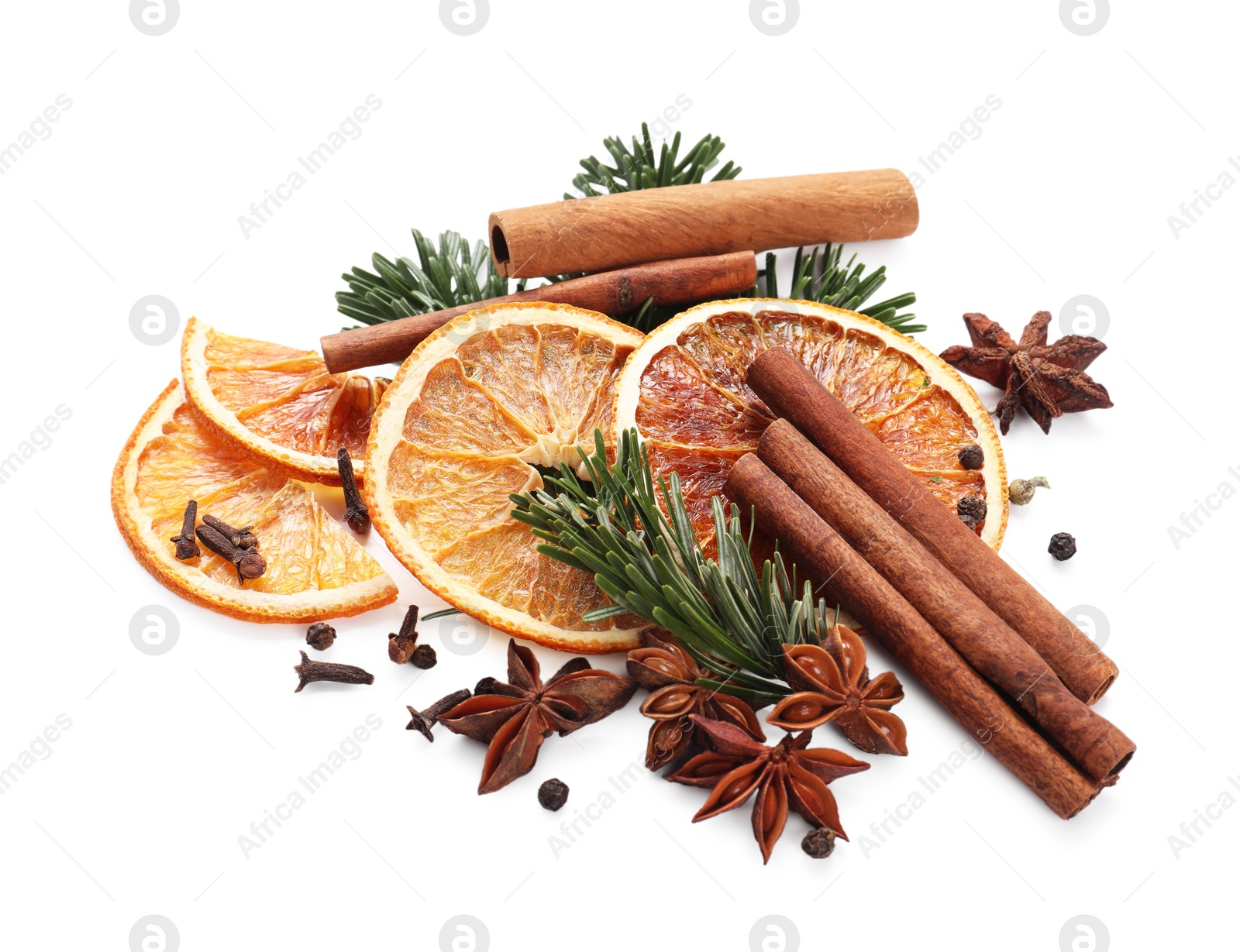 Photo of Different aromatic spices isolated on white. Christmas season