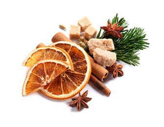 Photo of Different aromatic spices isolated on white. Christmas season