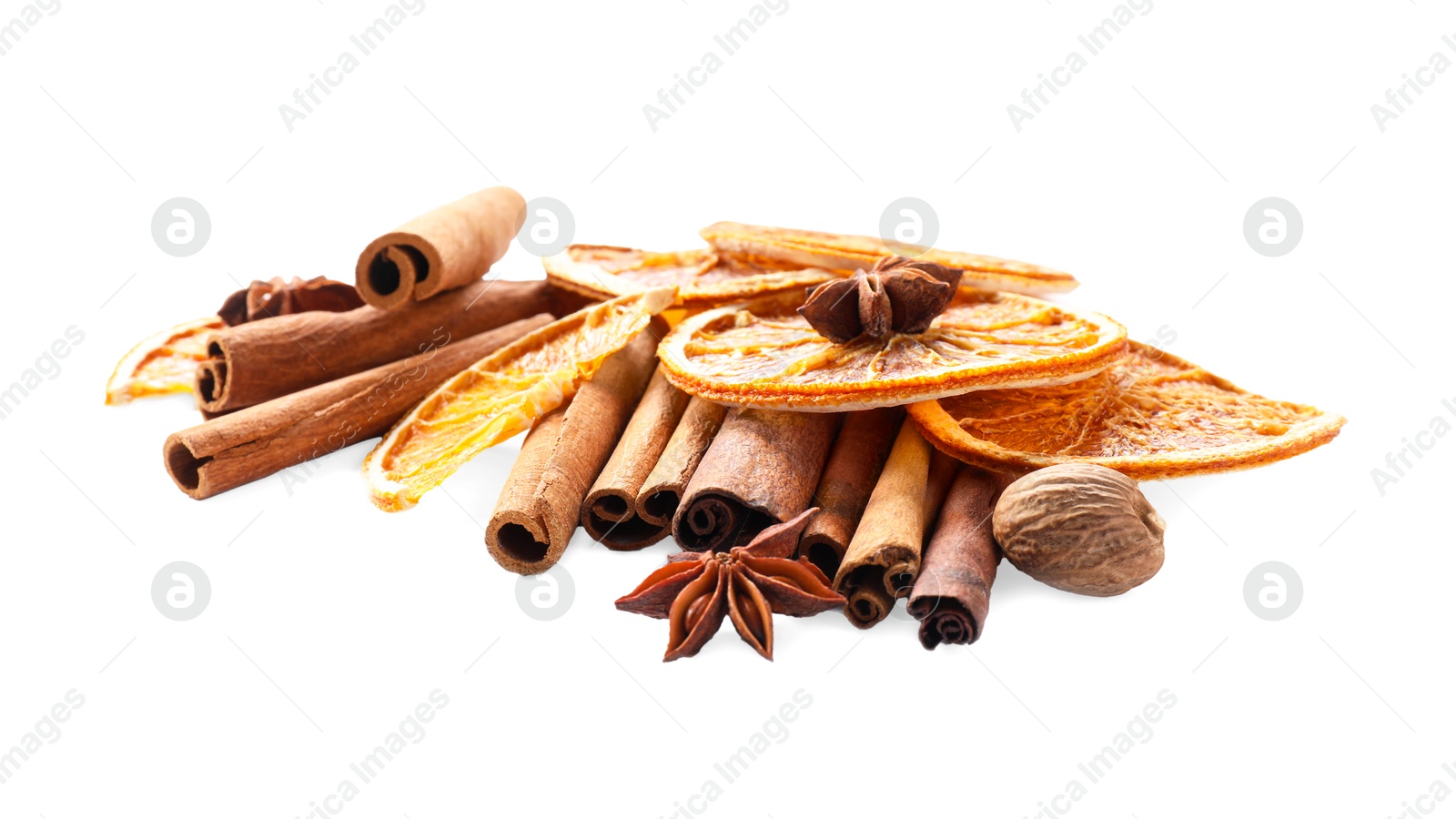 Photo of Different aromatic spices isolated on white. Christmas season