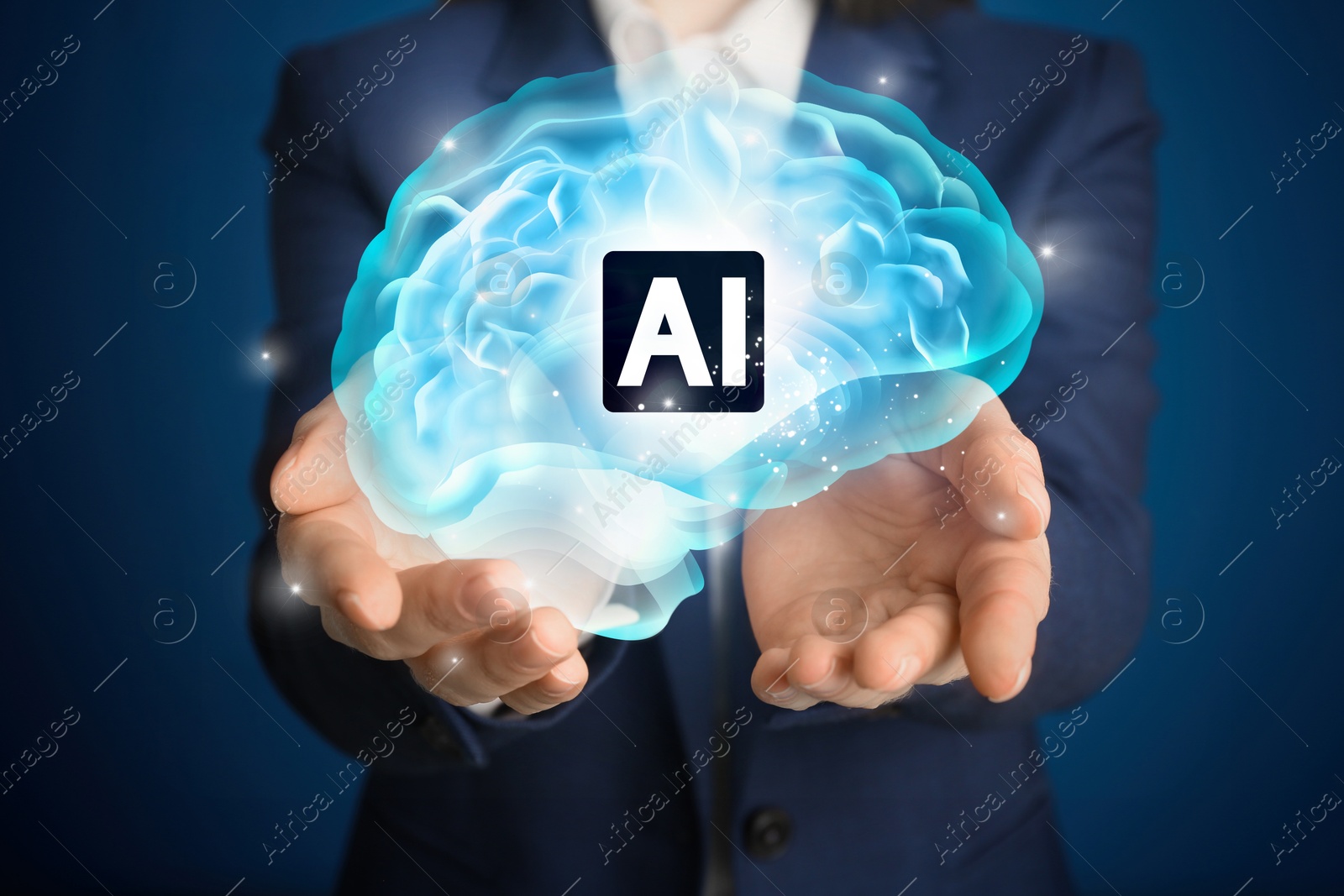 Image of Artificial intelligence. Businesswoman holding virtual brain with AI abbreviation on dark blue background, closeup