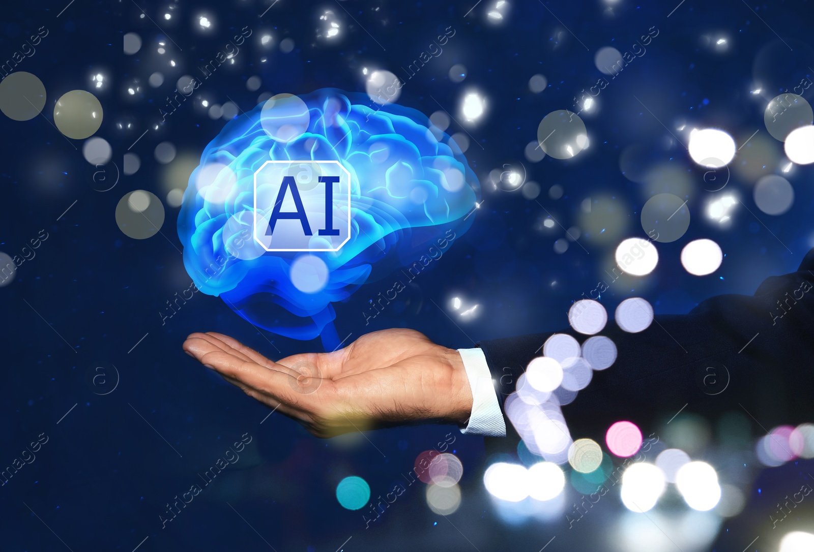 Image of Artificial intelligence. Businessman holding virtual brain with AI abbreviation on dark blue background, closeup