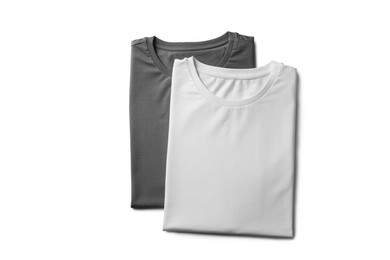 Image of White and grey t-shirts on white background, top view. Mockup for design