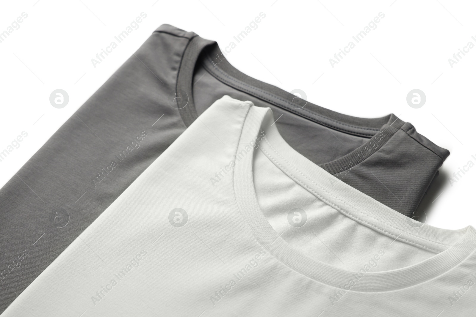 Image of White and grey t-shirts on white background, closeup