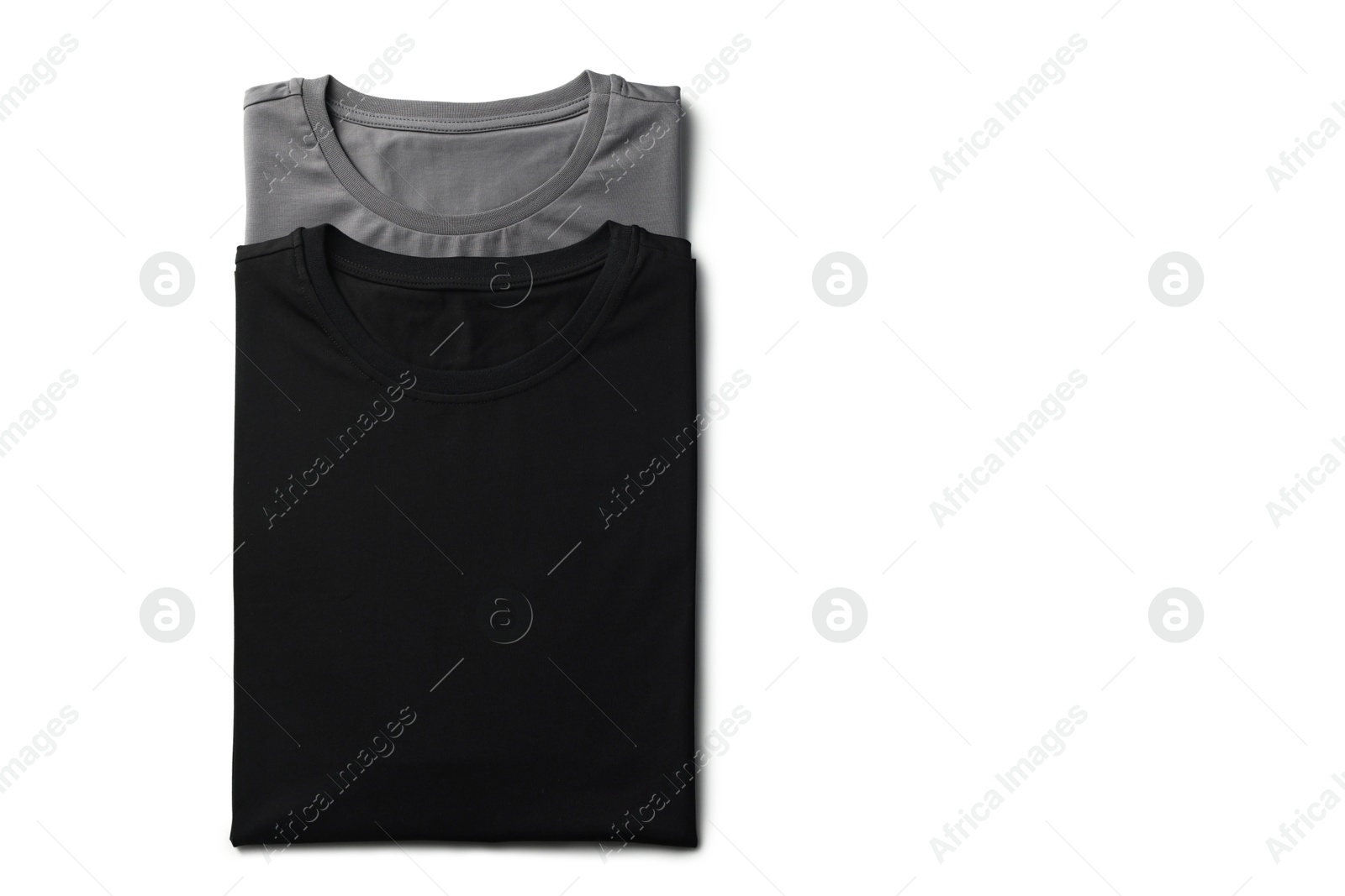 Image of Black and grey t-shirts on white background, top view. Mockup for design