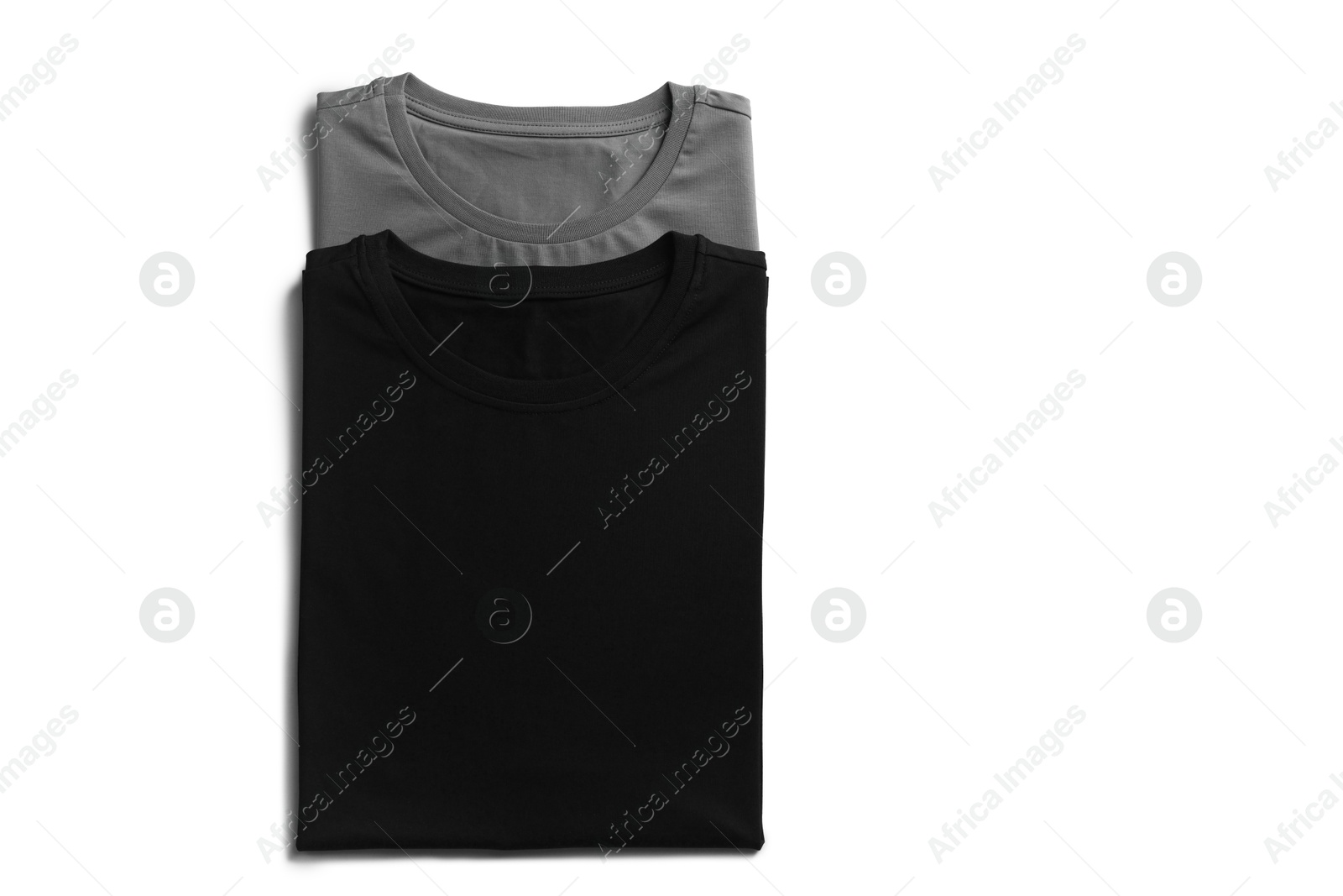 Image of Black and grey t-shirts on white background, top view. Mockup for design