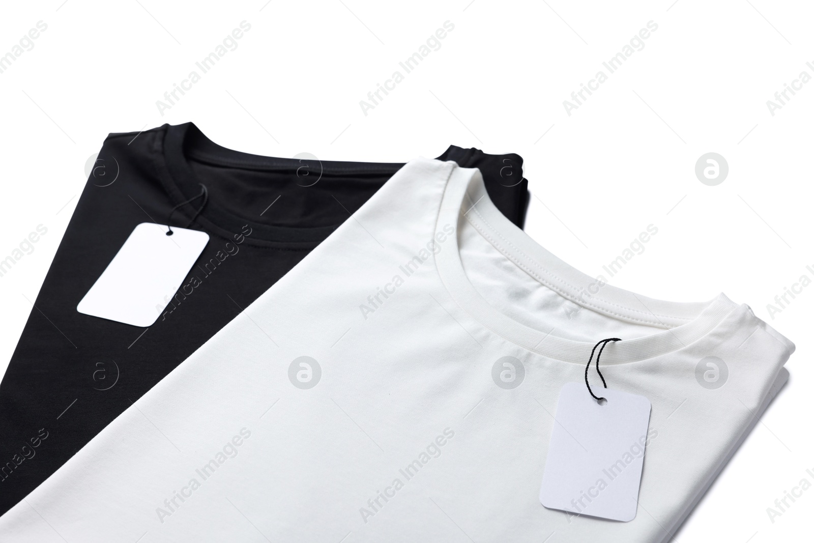 Image of Black and white t-shirts with tags on white background. Mockup for design