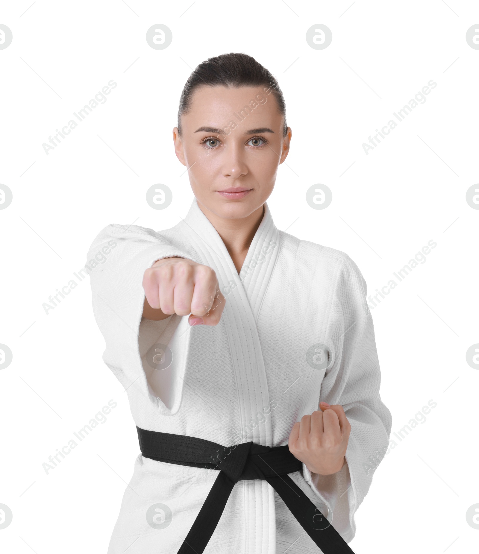 Photo of Karate fighter in kimono isolated on white