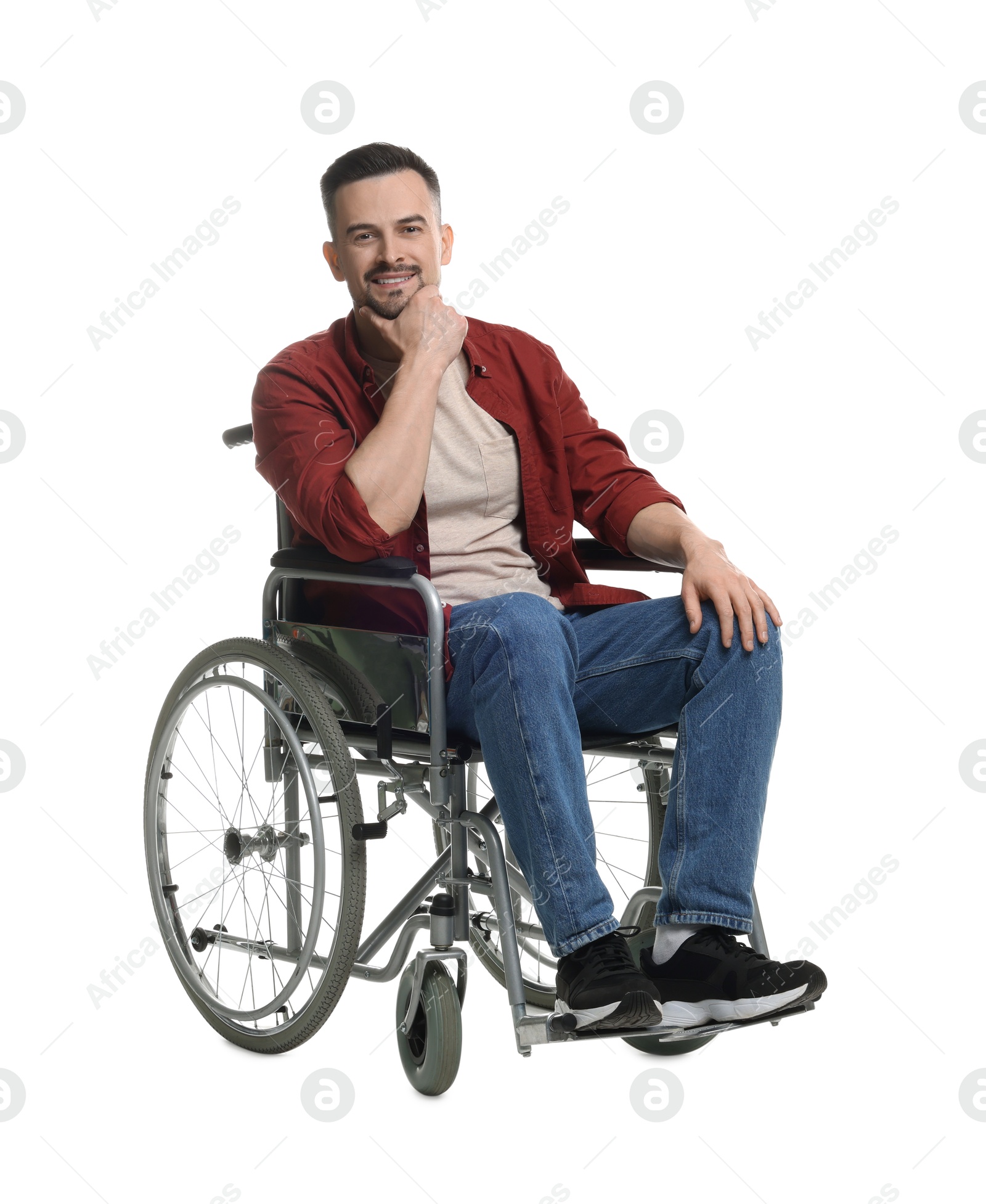 Photo of Smiling man in wheelchair on white background