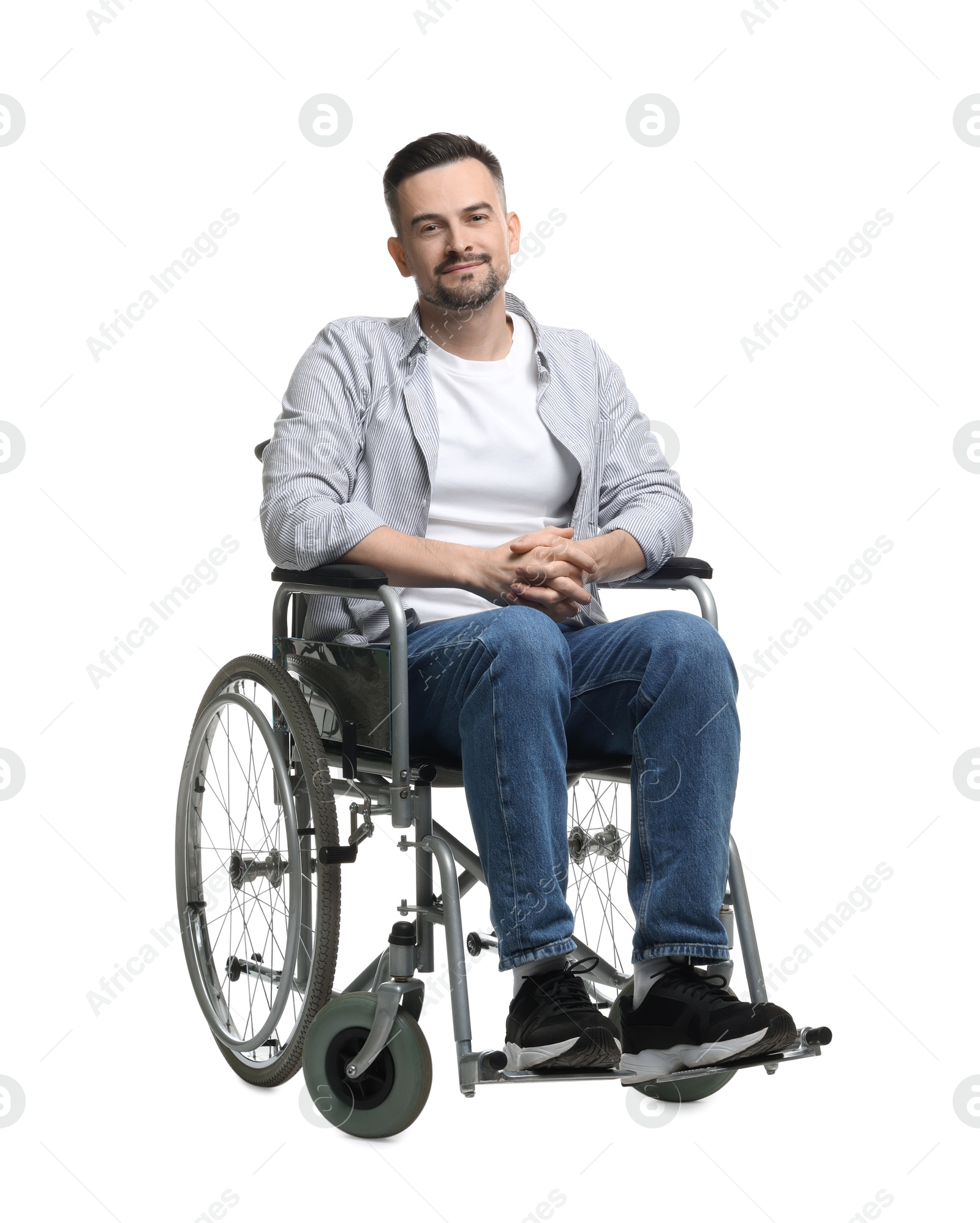 Photo of Smiling man in wheelchair on white background