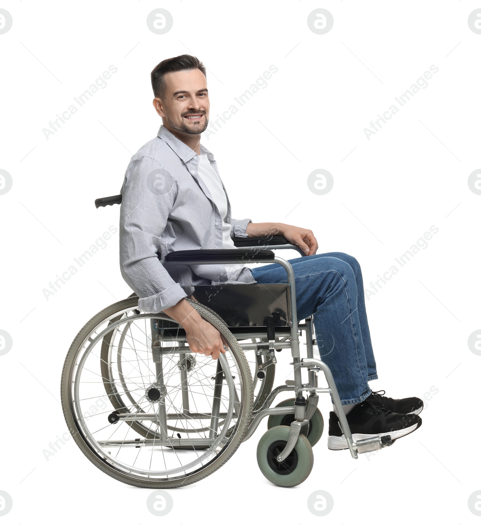 Photo of Smiling man in wheelchair on white background