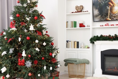 Beautifully decorated Christmas tree indoors. Festive interior design