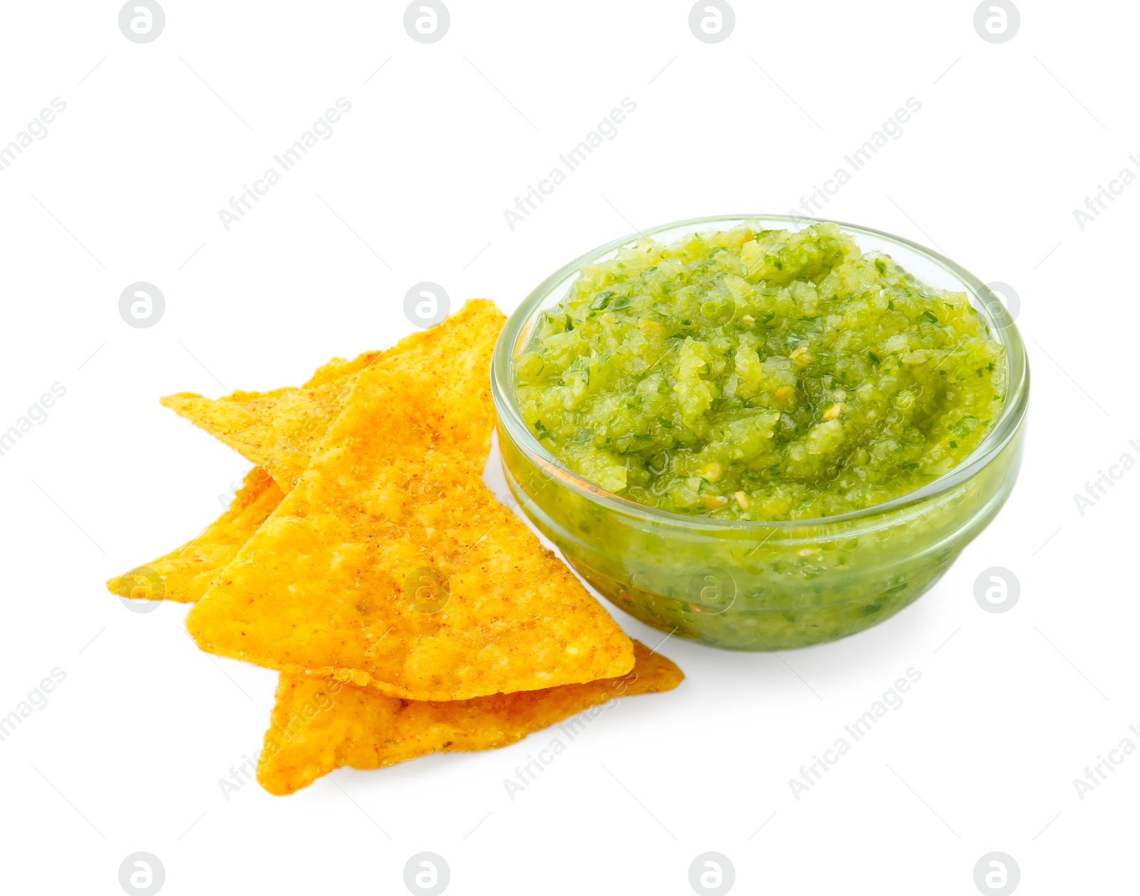 Photo of Delicious homemade green salsa with nachos isolated on white