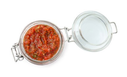 Photo of Delicious homemade red salsa in jar isolated on white, top view