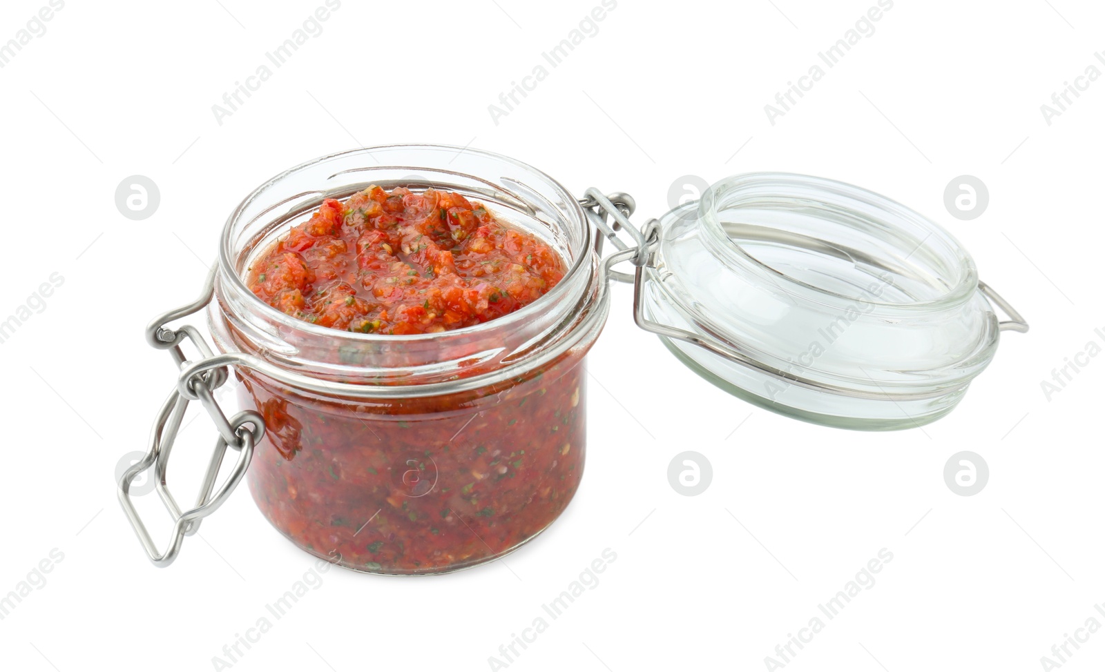 Photo of Delicious homemade red salsa in jar isolated on white