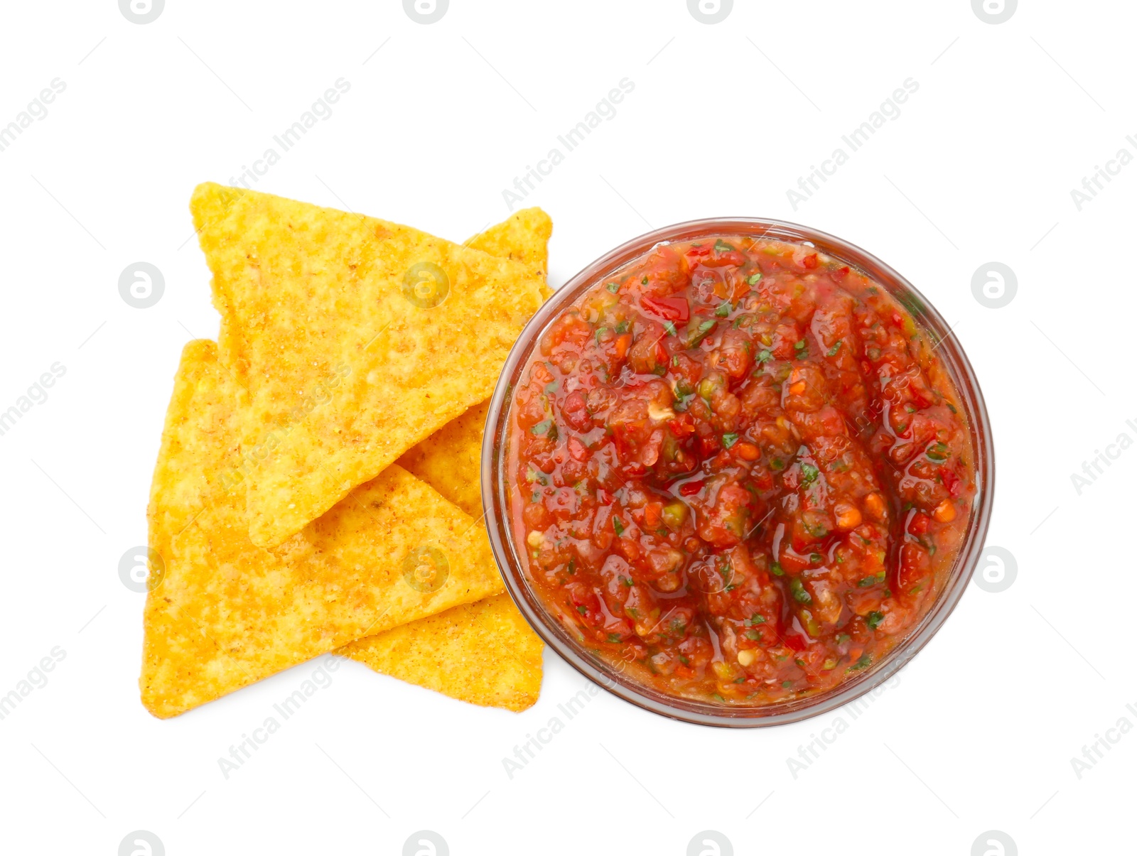 Photo of Delicious homemade red salsa with nachos isolated on white, top view