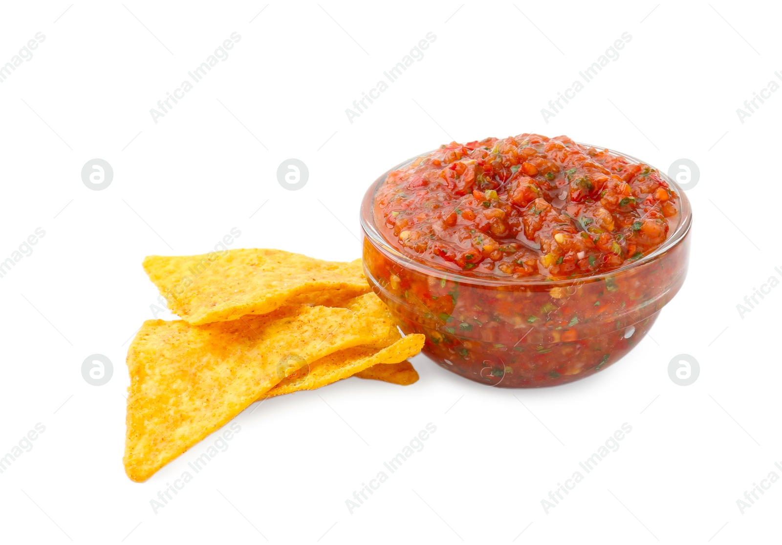 Photo of Delicious homemade red salsa with nachos isolated on white