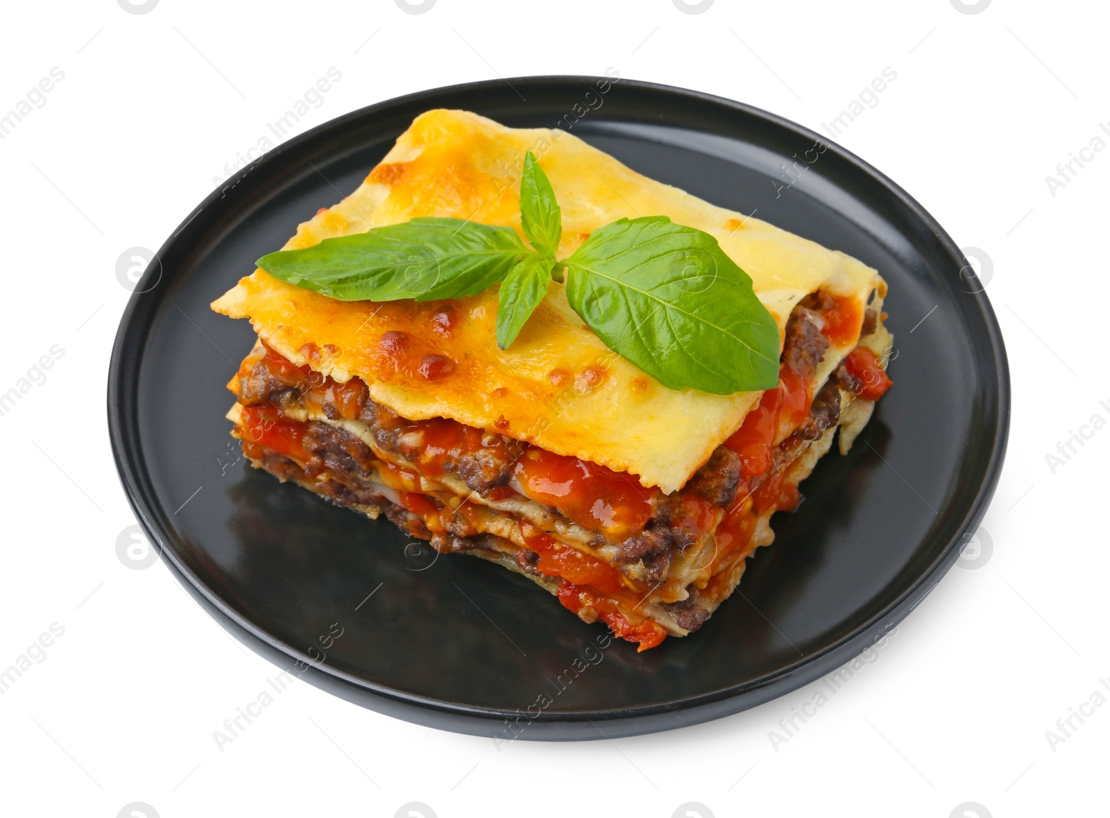 Photo of Delicious cooked lasagna with basil isolated on white