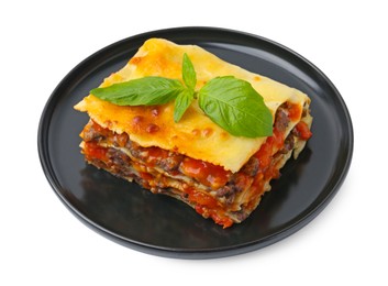 Photo of Delicious cooked lasagna with basil isolated on white