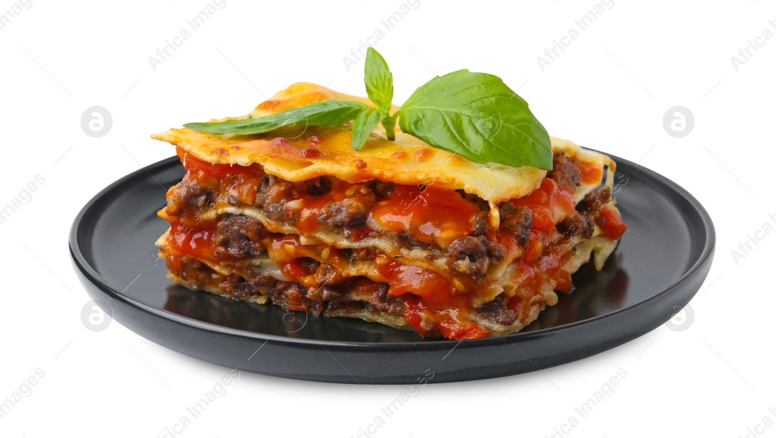 Photo of Delicious cooked lasagna with basil isolated on white