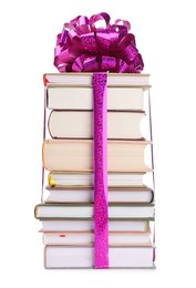 Photo of Stack of books with purple bow as gift isolated on white